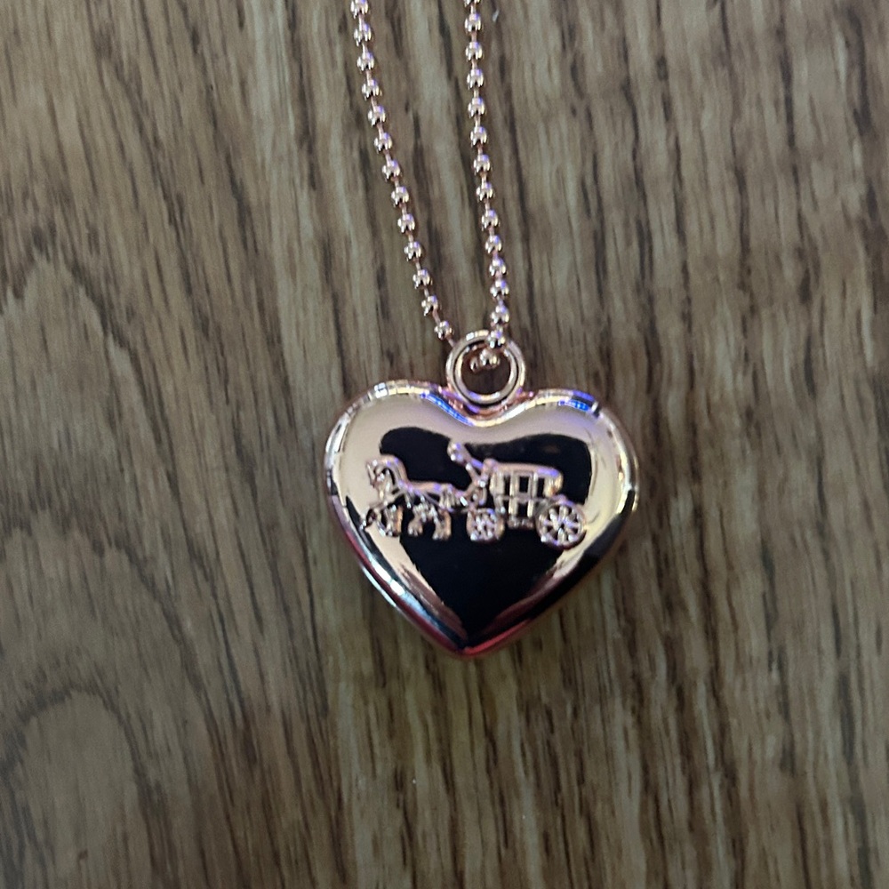 Coach bag keychain Heart-Shaped Keychain with Carriage Design